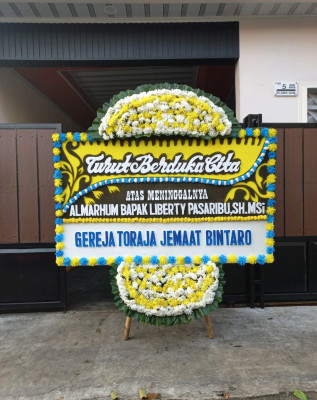 Papan Bunga Duka di Musuk